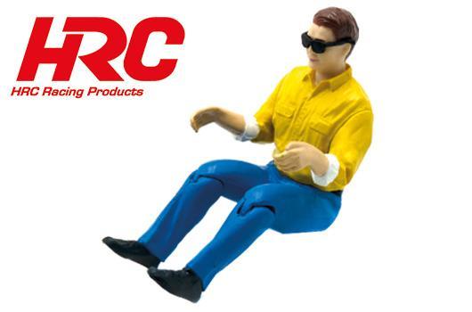 HRC Racing - HRC25266YS - Body Parts - 1/10 Crawler -  Pilota 64×80mm (con occhiali da sole) tuta gialla, pantaloni blu - gambe mobili